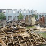 School teachers and staffs cleaned up the campus after the earthquake